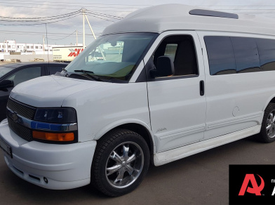 Пневмоподвеска на белый Chevrolet Express 1500, фото установки пневмобаллонов Рис. 1 Пневмоподвеска на белый Chevrolet Express 1500