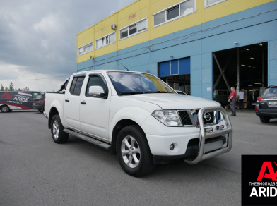 Наши проекты: Пневмоподвеска на заднюю ось Nissan Navara D40 (комплект вспомогательной пневмоподвески 44010) от компании «ARIDE». Доступные цены, гарантия, для заказа и получения консультации звоните 8 (800) 707-52-13. Рис. 1 Наши проекты: Пневмоподвеска на заднюю ось Nissan Navara D40 (комплект вспомогательной пневмоподвески 44010)